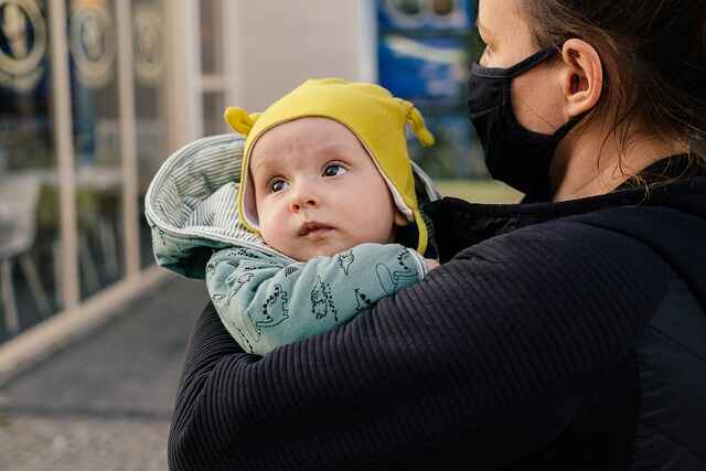 Hold your baby upright